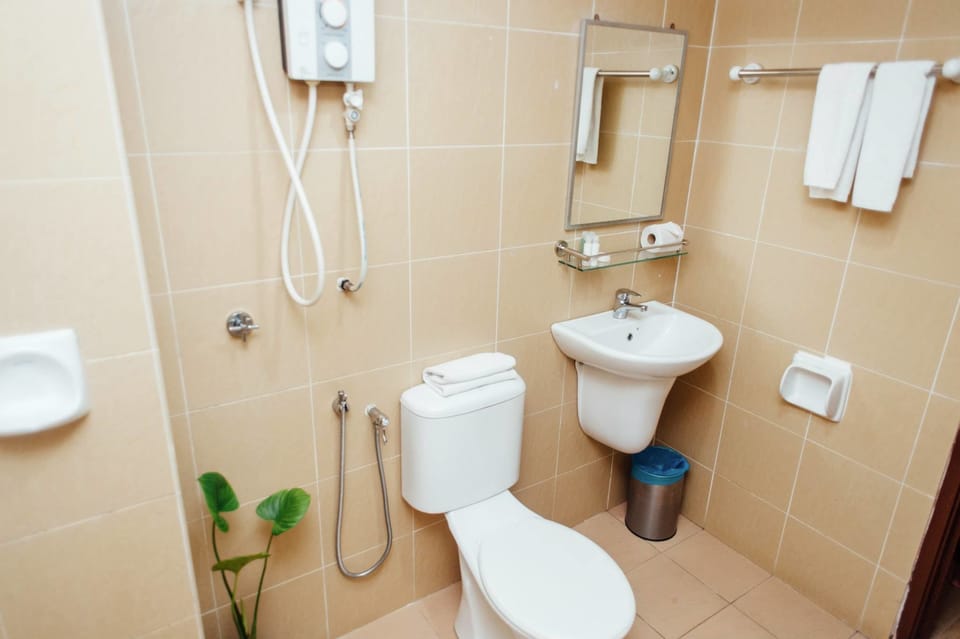 Shower, free toiletries, slippers, towels