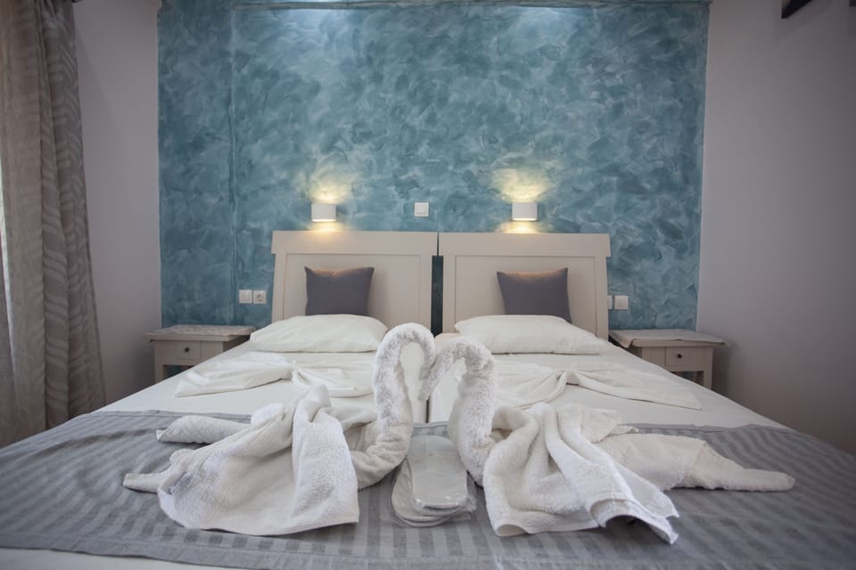 Economy Apartment, 1 Bedroom (Triple) | Egyptian cotton sheets, premium bedding, minibar, in-room safe