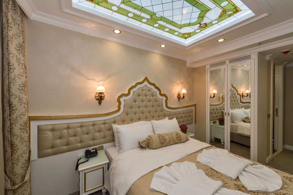 Family Room | Premium bedding, down comforters, minibar, in-room safe