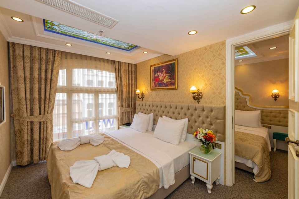 Family Room | Premium bedding, down comforters, minibar, in-room safe