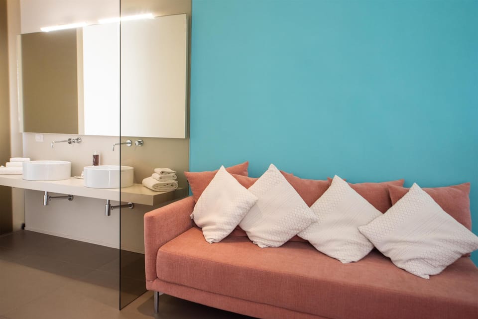 Deluxe Triple Room, Terrace, Sea View | Premium bedding, minibar, in-room safe, desk