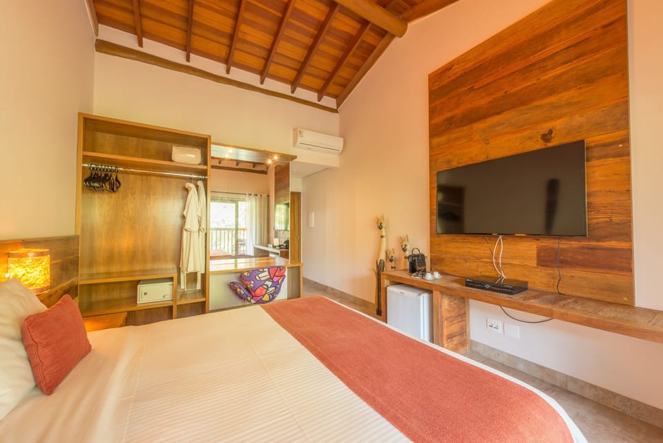 Double Room, Jetted Tub | Minibar, in-room safe, individually decorated, desk