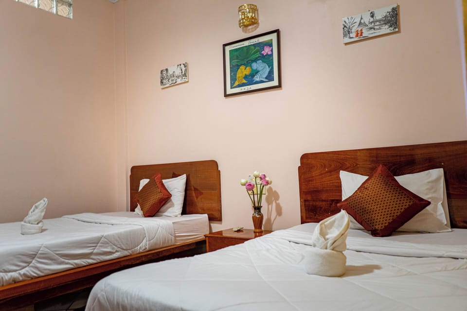Twin Room | Minibar, in-room safe, desk, soundproofing