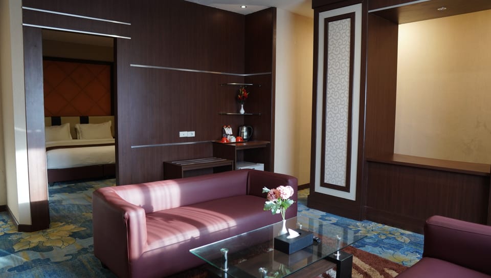 Family Suite | Living area | Flat-screen TV