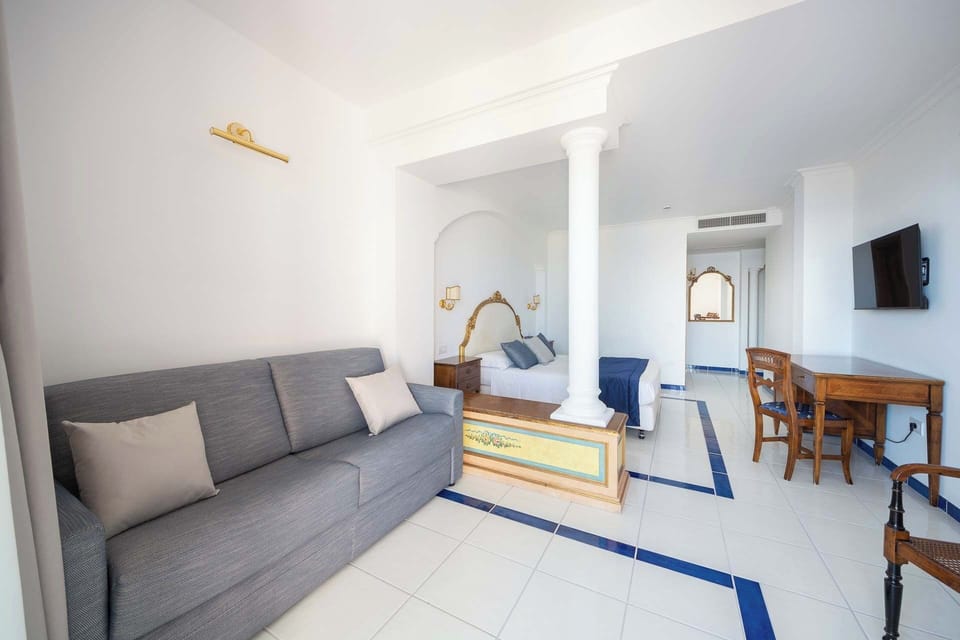 Junior Suite, Balcony, Sea View | Frette Italian sheets, premium bedding, down comforters, minibar