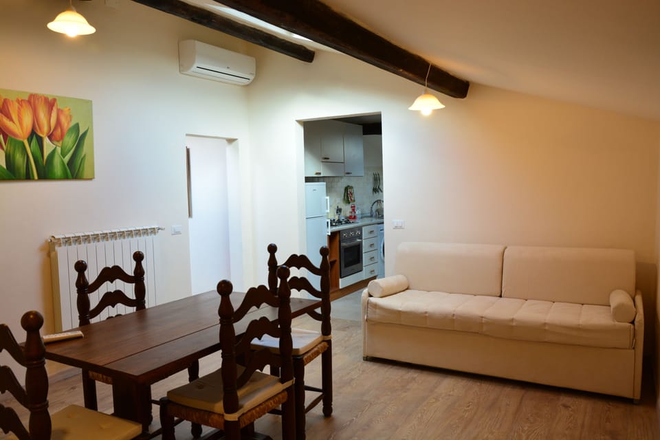 Comfort Apartment, Kitchen, City View (mansard, second floor, no elevator) | Living room | Flat-screen TV