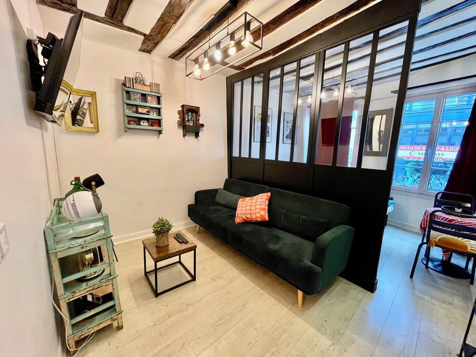 City Studio | Living area | 41-inch Smart TV with cable channels