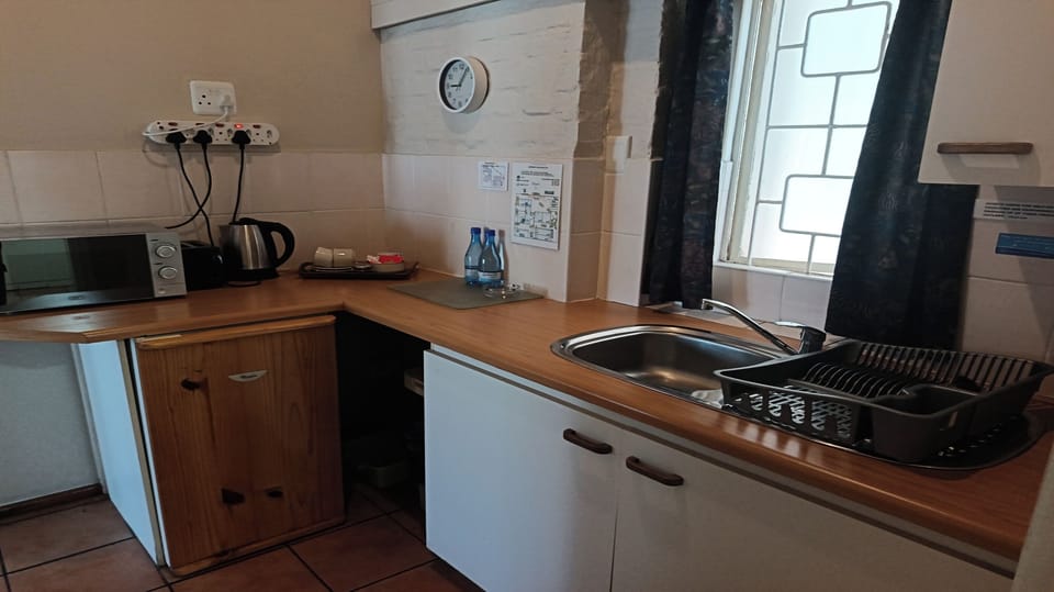 Fridge, microwave, electric kettle, toaster