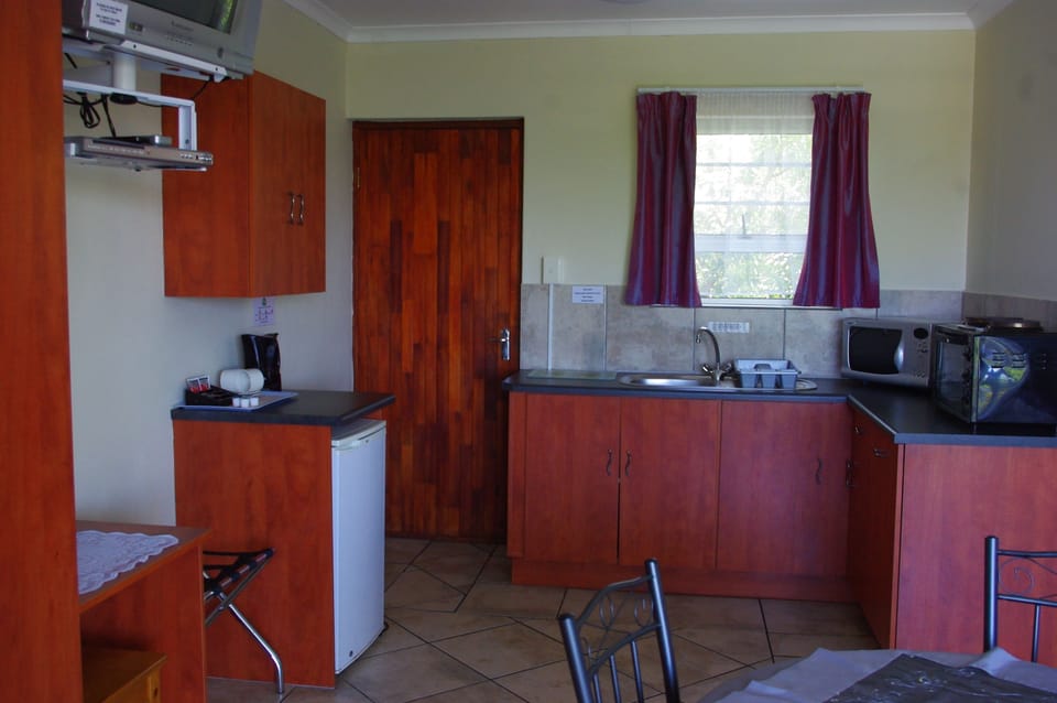 Fridge, microwave, electric kettle, toaster
