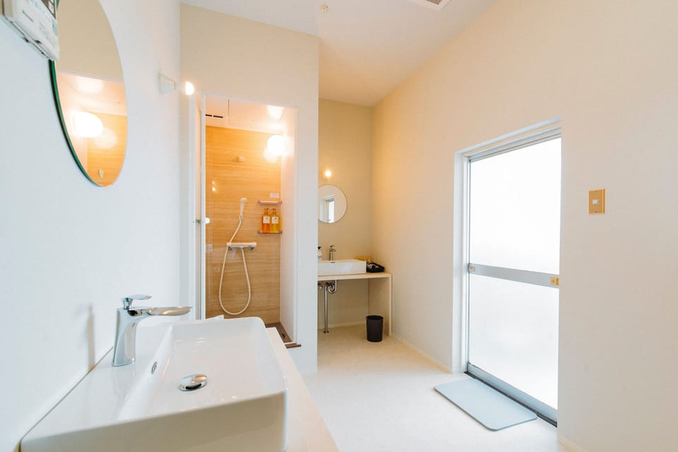 Shower, free toiletries, hair dryer, slippers