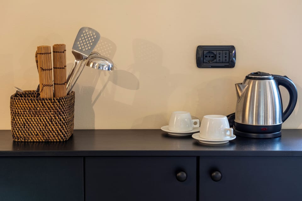 Family Suite, Kitchenette, Ground Floor | Premium bedding, minibar, in-room safe, desk