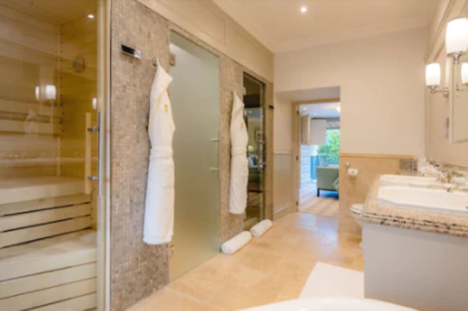 The Gate Lodge | Bathroom | Designer toiletries, hair dryer, bathrobes, slippers