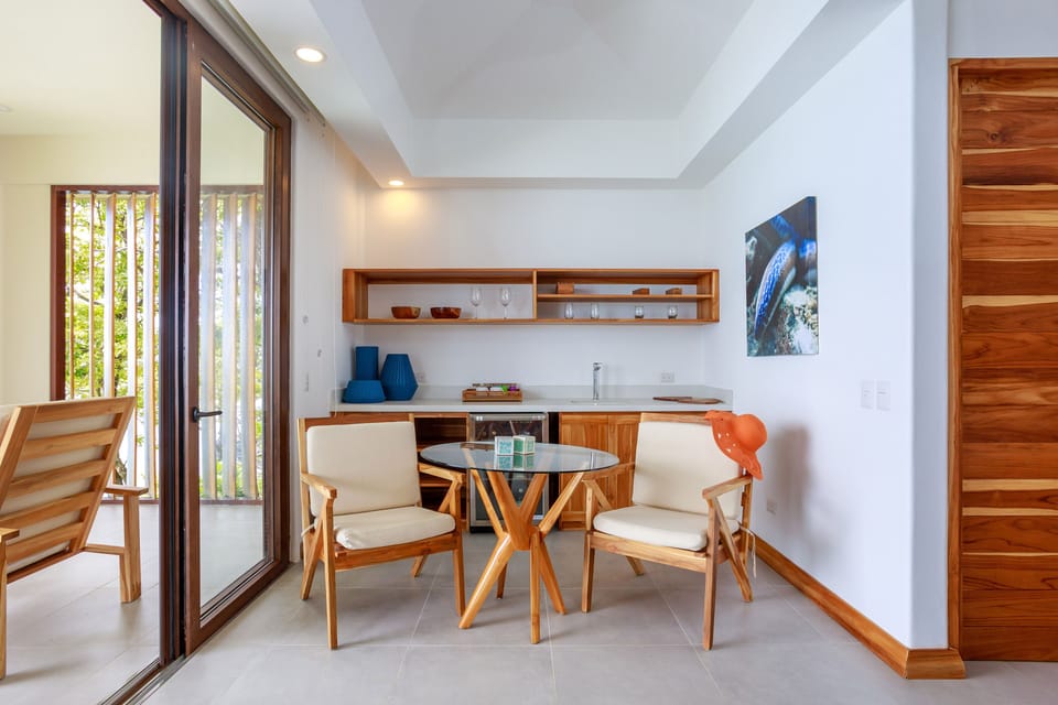 Ocean View Premium Suite | Premium bedding, minibar (free items), in-room safe, desk