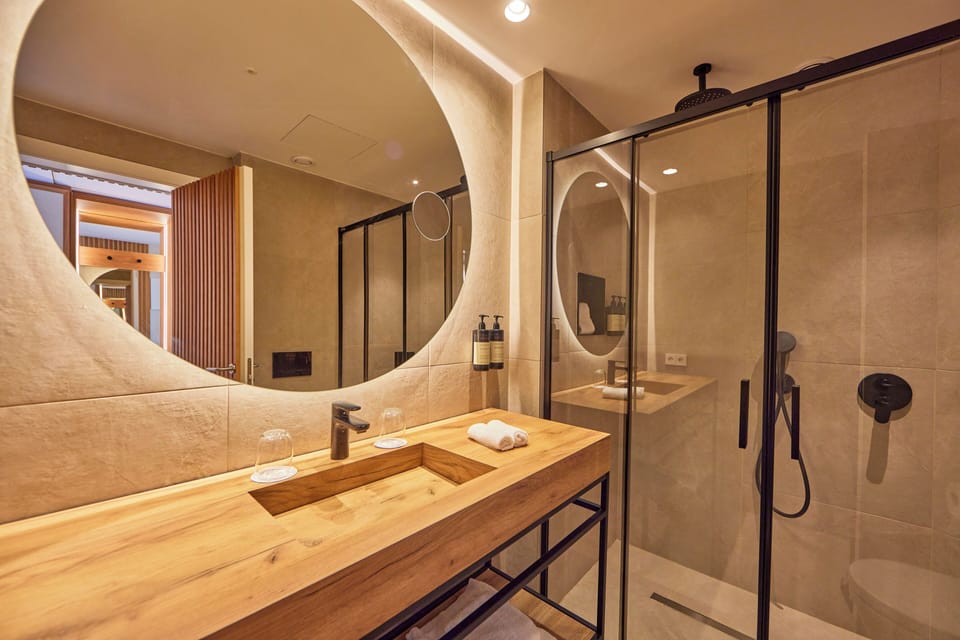 Eco-friendly toiletries, hair dryer, bathrobes, slippers