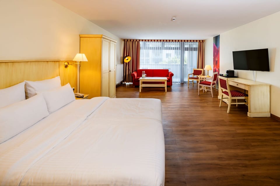 Junior Studio Suite, Non Smoking, Balcony | Minibar, in-room safe, desk, soundproofing