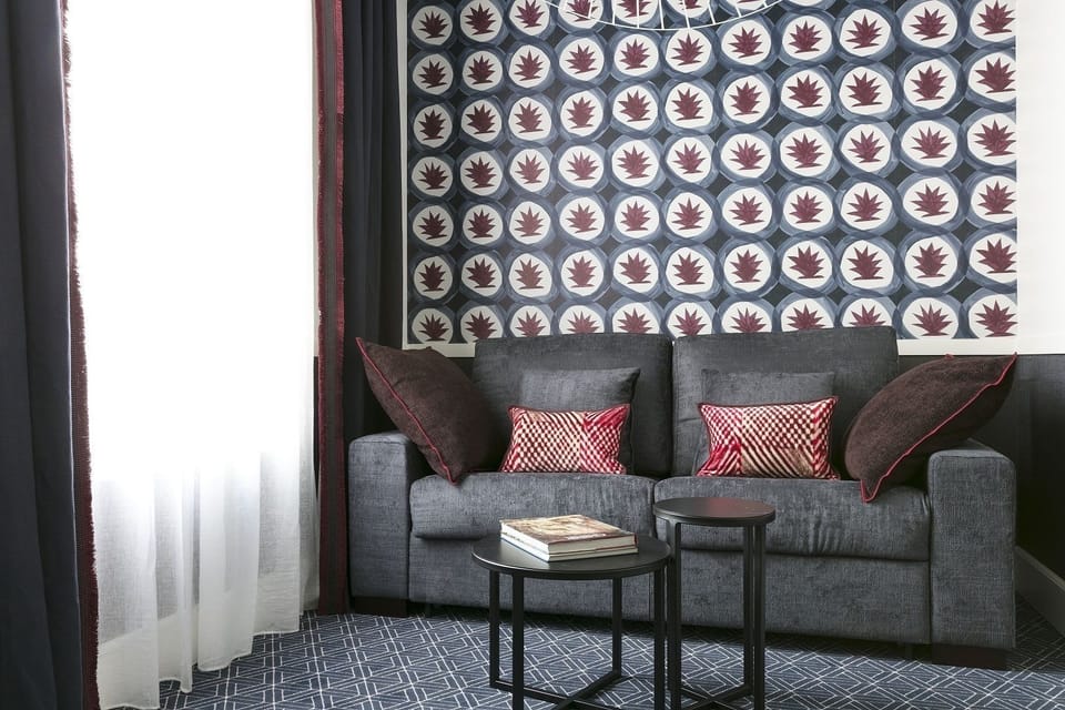 Junior Suite | Premium bedding, in-room safe, individually decorated, blackout drapes