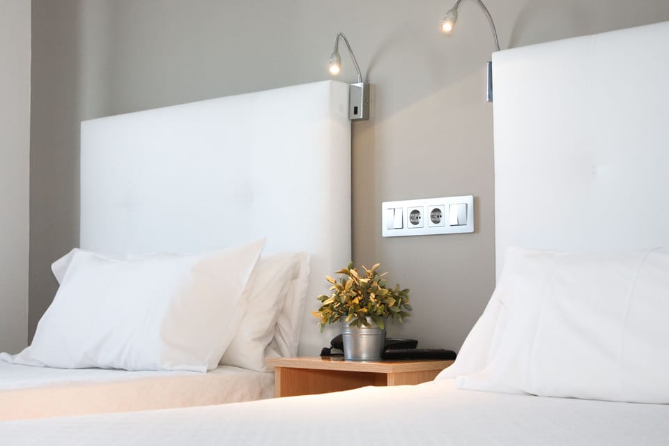 Family Room (Superior) | Premium bedding, desk, blackout drapes, iron/ironing board