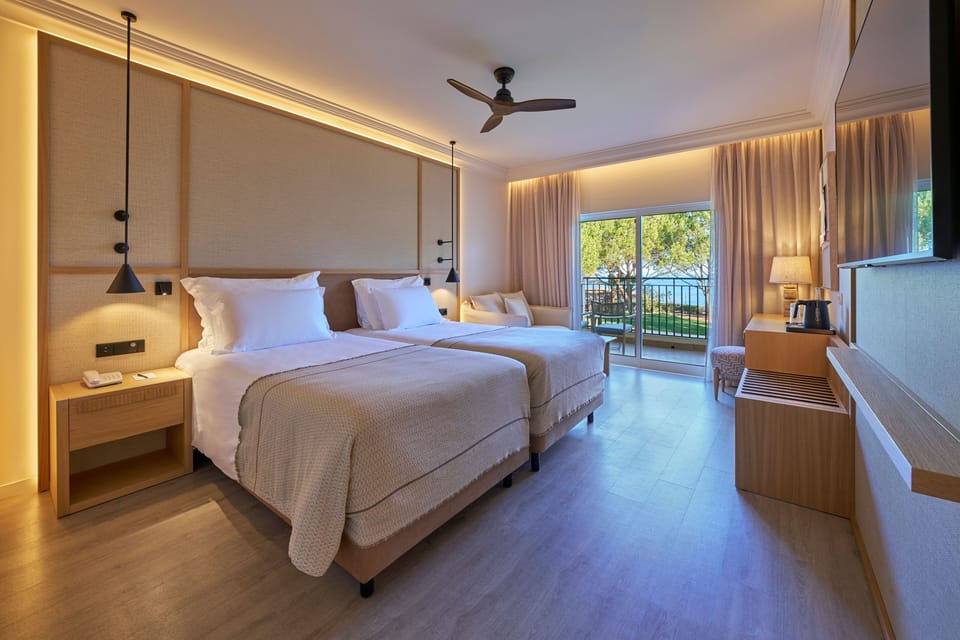Double or Twin Room, Sea View | Beach/ocean view