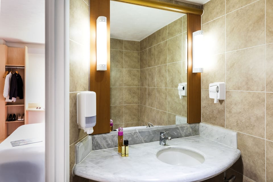 Eco-friendly toiletries, hair dryer, towels