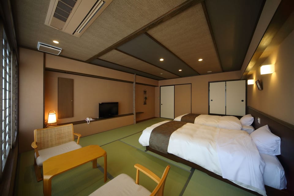 Standard Twin Room, Non Smoking | In-room safe, desk, blackout drapes