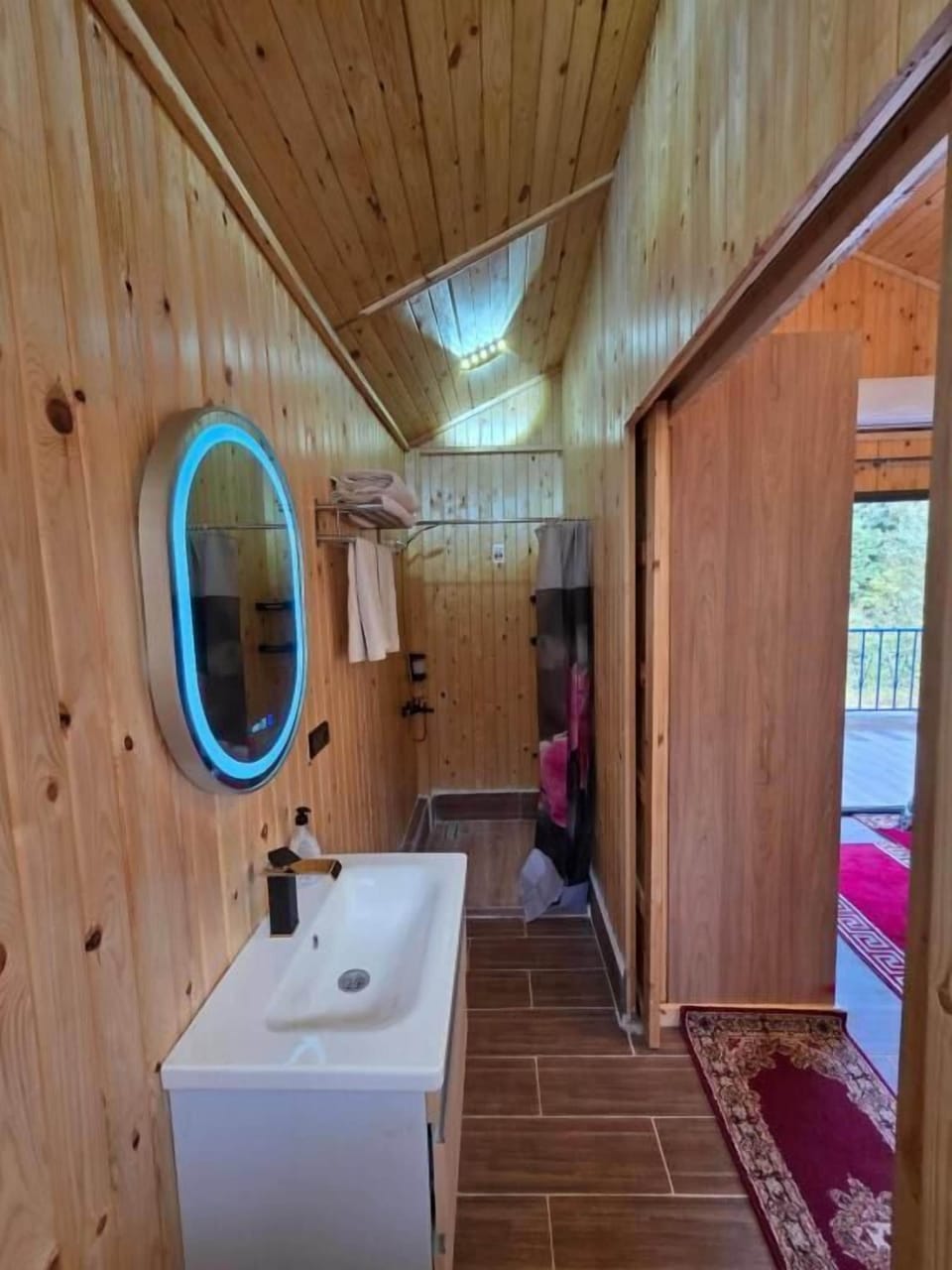 Senior Cabin | Bathroom | Shower, free toiletries, towels, soap