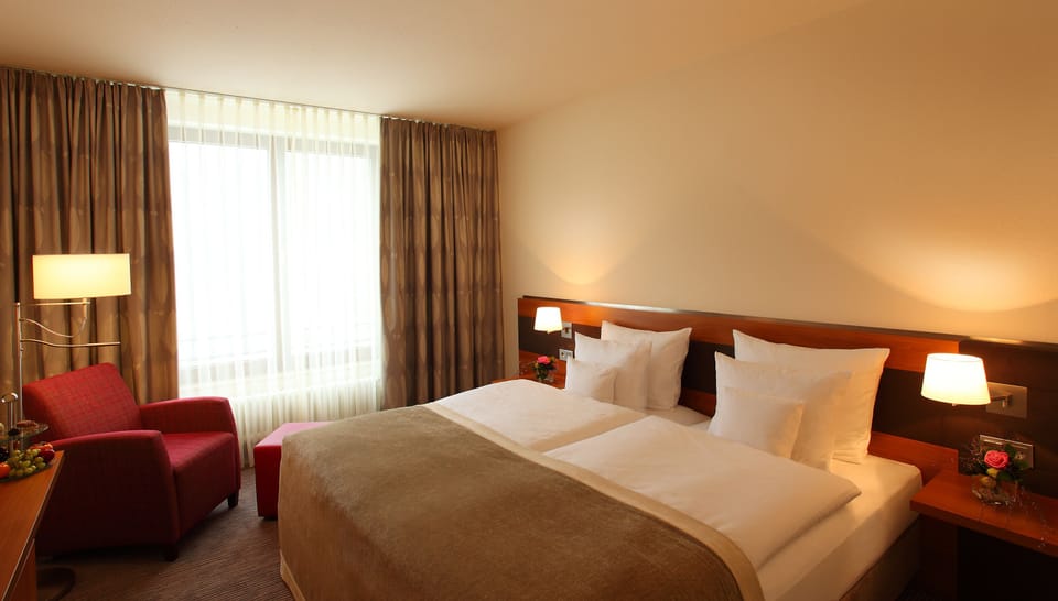 Comfort Room | Hypo-allergenic bedding, desk, laptop workspace, blackout drapes