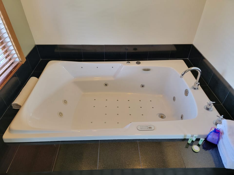 Romantic Suite, 1 King Bed, Jetted Tub | Individually decorated, individually furnished, free WiFi, bed sheets