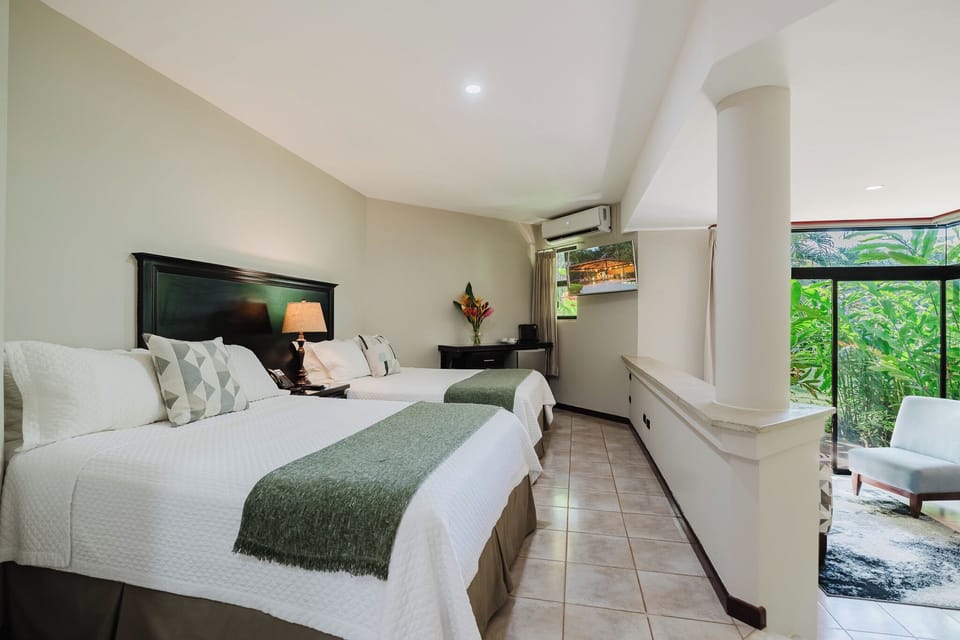 Family Suite | Premium bedding, down comforters, in-room safe, individually decorated
