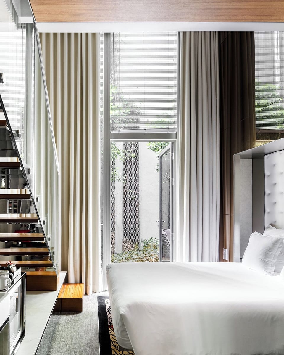 Loft Terrace Room (One Large Double Bed) | Minibar, in-room safe, desk, laptop workspace