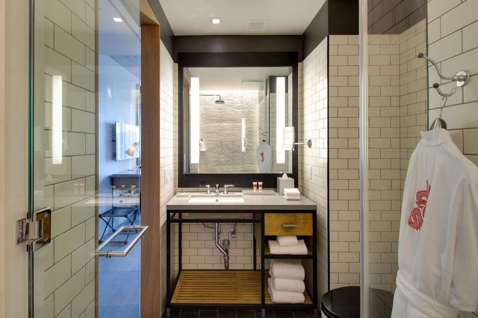 Designer toiletries, hair dryer, bathrobes, towels