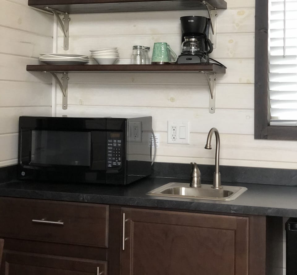 Economy Cabin, 1 Bedroom, Mountain View (Bring your own sleeping bags, pillows, and towels) | Living area | 29-inch flat-screen TV with satellite channels