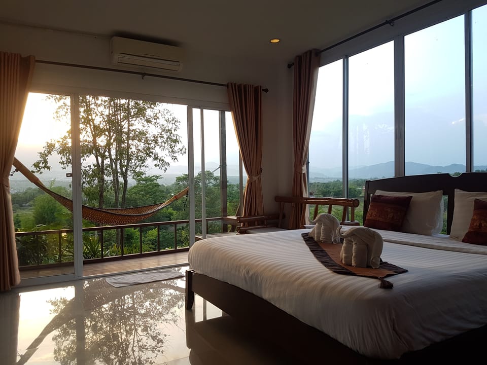 Panoramic Room, 1 King Bed, Mountain View | Minibar, in-room safe, desk, free WiFi
