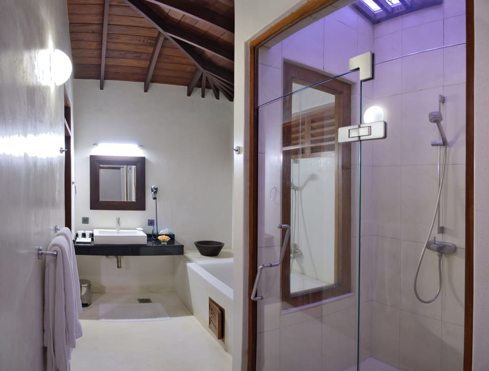 Villa, Garden Area | Bathroom | Combined shower/tub, rainfall showerhead, free toiletries, hair dryer