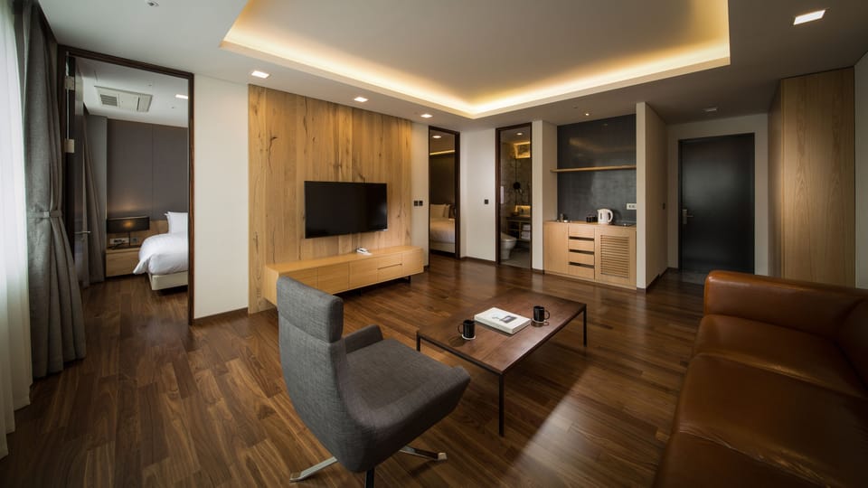 Family Suite (Mountain View)+Aragonite Hot Springs&Free swimming pool for 4 pax, Free fitness | Living room | 50-inch LCD TV with cable channels, TV, pay movies