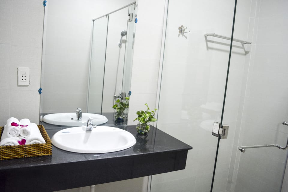 Shower, free toiletries, hair dryer, slippers