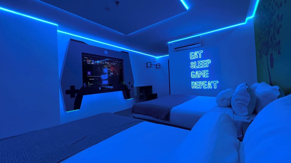 Family Game Room with PS5 | Desk, blackout drapes, free WiFi, bed sheets