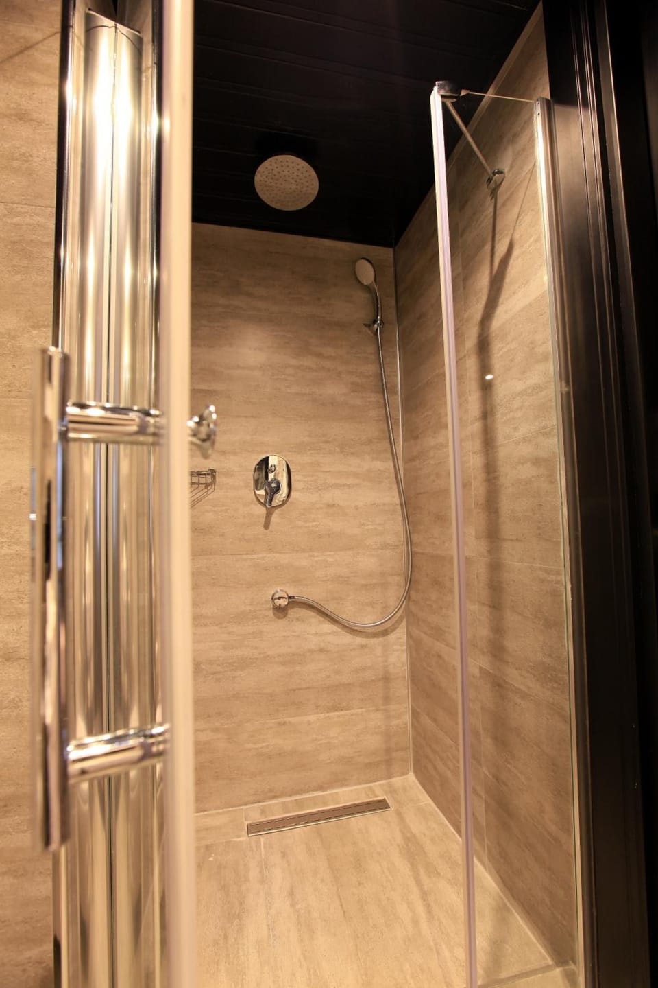 Shower, free toiletries, hair dryer, slippers