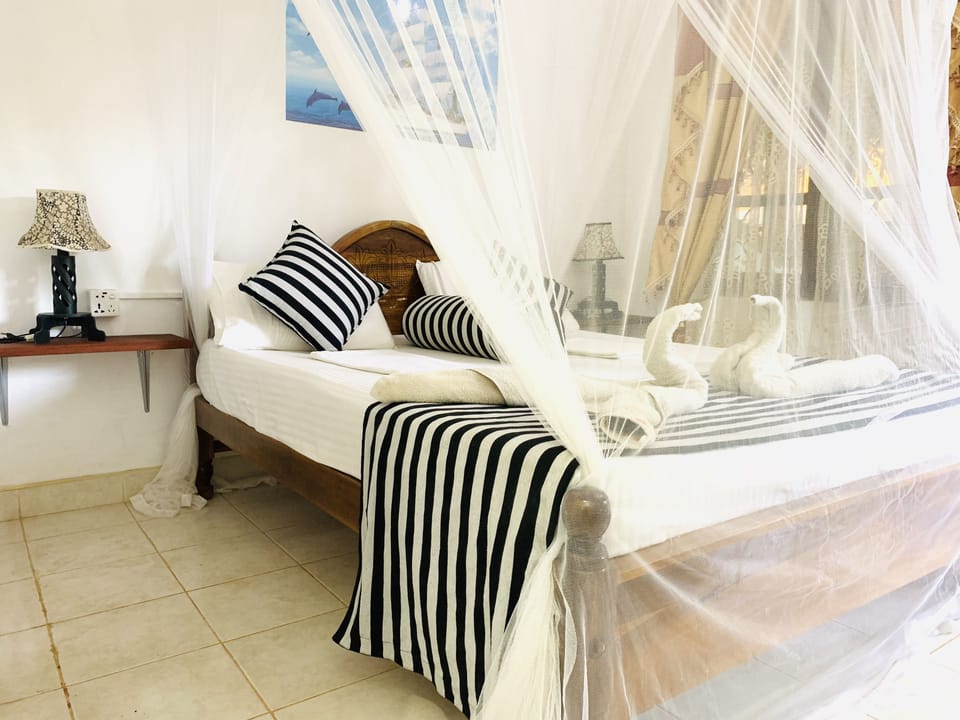 Deluxe Double Room, 1 Bedroom, Garden View | 6 bedrooms, in-room safe, desk, soundproofing