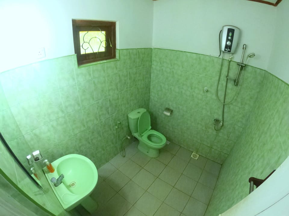Double Room, Garden View | Bathroom | Shower, free toiletries, hair dryer, towels