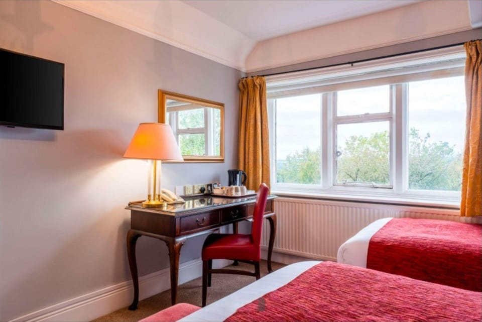 Desk, blackout drapes, soundproofing, iron/ironing board