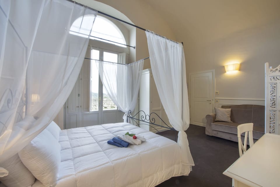 Luxury Quadruple Room, 1 Bedroom, City View | Premium bedding, minibar, in-room safe, desk