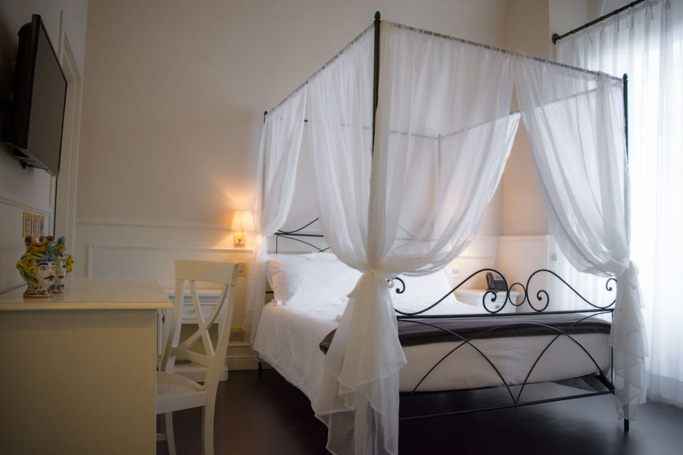 Luxury Quadruple Room, 1 Bedroom, City View | Premium bedding, minibar, in-room safe, desk