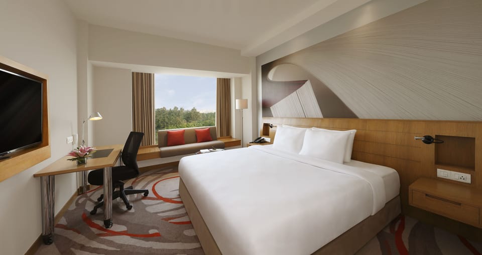 Premium bedding, down comforters, pillowtop beds, minibar