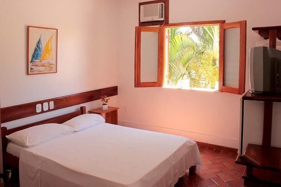 Standard Room | Minibar, individually decorated, blackout drapes, free WiFi