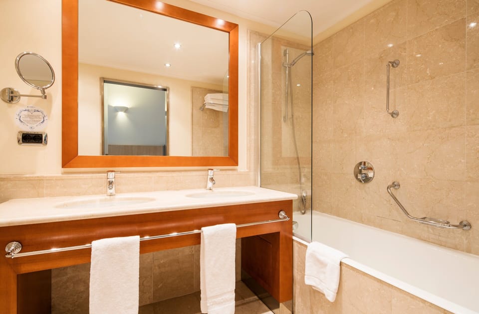 Combined shower/tub, eco-friendly toiletries, hair dryer, towels