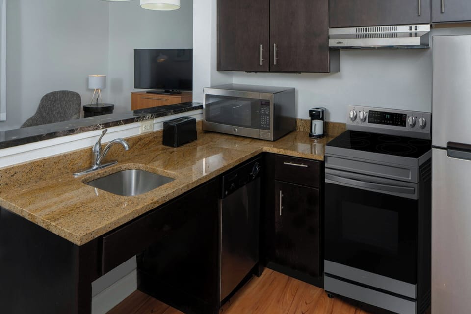 Suite, 2 Bedrooms | Pillowtop beds, in-room safe, desk, iron/ironing board