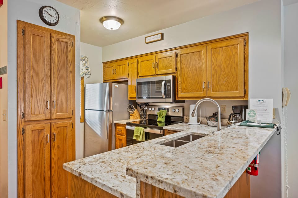 Family Condo, 2 Bedrooms (1.5 Bathrooms, Walk-in shower) | Private kitchen | Full-size fridge, microwave, oven, stovetop