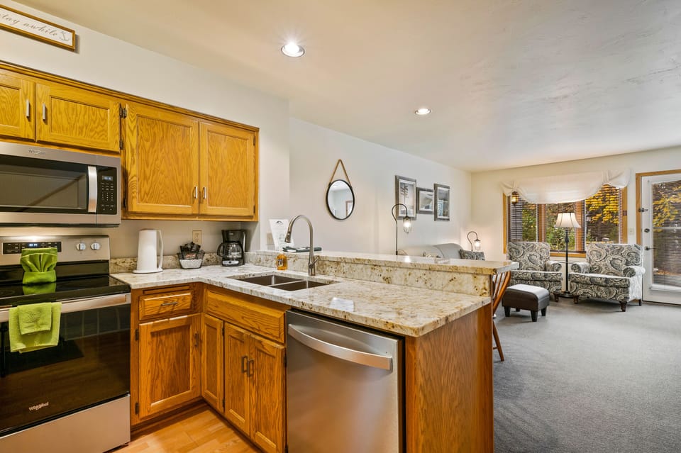 Family Condo, 2 Bedrooms (1.5 Bathrooms, Walk-in shower) | Private kitchen | Full-size fridge, microwave, oven, stovetop