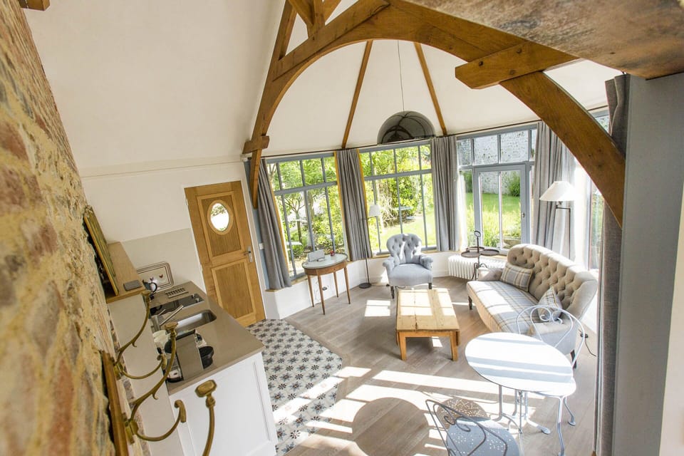 Romantic Cottage, 1 Bedroom | Living area | Flat-screen TV, iPod dock