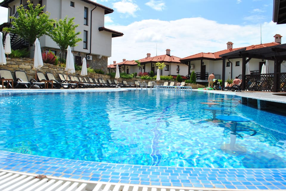 Indoor pool, 4 outdoor pools, open 8:00 AM to 6:00 PM, pool umbrellas